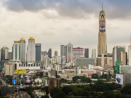 Skyline of big city full of skyscrapers in the business district of Bangkok, view from condominium in Petchburi Roadのeditorial素材