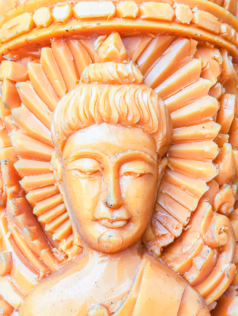 Beautiful wax candle crafted with Buddha and angels images at Ubon Ratchathani Province, Thailandの写真素材