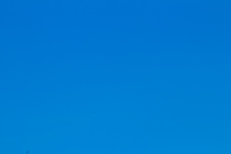 Clear blue sky without clouds. Cloudless sky. Blue sky without a cloud obscured the view daytime desolate empty air clean.の写真素材