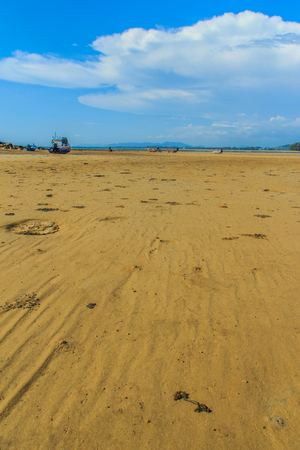 Exotic and beautiful wave pattern on the sand in the beach after sea water receded.の写真素材