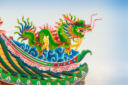Beautiful Dragon Sculpture on the Chinese Pavilion Roof in the Chinese Templeの写真素材
