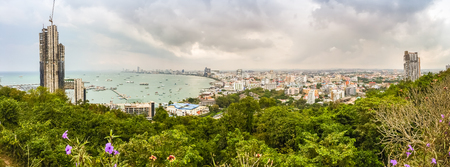 Pattaya, Thailand - January 21, 2016: The new highrise buildings obscured the beautiful of Pattaya bay view on Pratamnak Hill nearby Balihai pier in Pattaya,Thailand. Pattaya city is famous about sea sport and night life entertainment.のeditorial素材