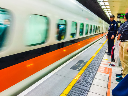 Taoyuan, Taiwan - November 20, 2015: View at the platform of Taiwan High Speed Rail (HSR) Taoyuan Station. The high speed railway has become the most important transportation that runs approximately 345 km along the west coast of Taiwan.のeditorial素材
