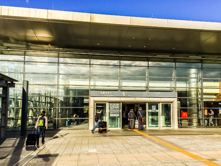Taoyuan, Taiwan - November 20, 2015: Tourist at the entrance gate of Taiwan High Speed Rail (HSR) Taoyuan Station. The high speed railway has become the most important transportation in Taiwan.のeditorial素材