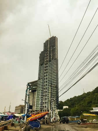 Pattaya, Thailand - January 21, 2016: The new highrise buildings obscured the beautiful of Pattaya bay view on Pratamnak Hill nearby Balihai pier in Pattaya,Thailand. Pattaya city is famous about sea sport and night life entertainment.のeditorial素材