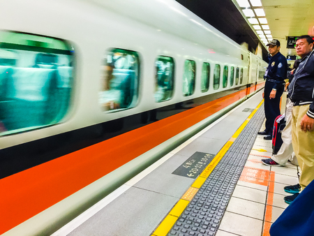 Taoyuan, Taiwan - November 20, 2015: View at the platform of Taiwan High Speed Rail (HSR) Taoyuan Station. The high speed railway has become the most important transportation that runs approximately 345 km along the west coast of Taiwan.のeditorial素材