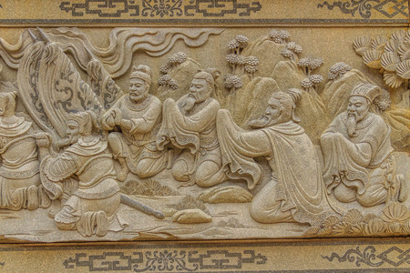 Detailed Chinese design with Gods statues in gold including walls sculptures of dragons and horses at Wenwu Temple in Puli County of Taiwanのeditorial素材