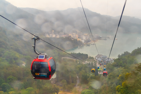 Raining at The Sun Moon Lake Ropeway , the scenic gondola cable car service that connects Sun Moon Lake with the Formosa Aboriginal Culture Village theme park.のeditorial素材