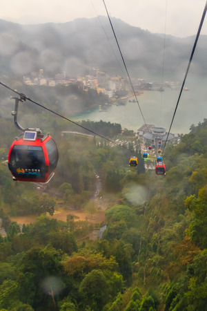 Raining at The Sun Moon Lake Ropeway , the scenic gondola cable car service that connects Sun Moon Lake with the Formosa Aboriginal Culture Village theme park.のeditorial素材