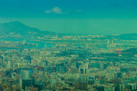 Aerial panorama over Taipei, capital City of Taiwan, on a blue sky and cloudy dayのeditorial素材