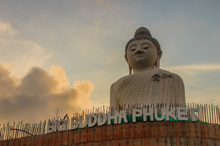 Amazing Massive white marble Buddha statue, the famous tourist attraction on top of hill in Phuket, Thailand.の写真素材