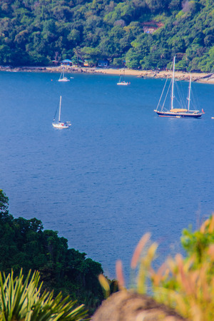 Beautiful landscape and Seascape views of Laem Promthep or Promthep cape, the most popular sunset view point and landmark of Phuket, Thailand.の写真素材