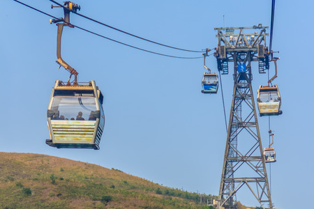 Lantau Island, Hong Kong - November 14, 2014: Beautiful view from Hong Kong cable cars, the popular public transportation from Tung Chung Station to Ngong Ping village, Lantau Island, Hong Kong.のeditorial素材
