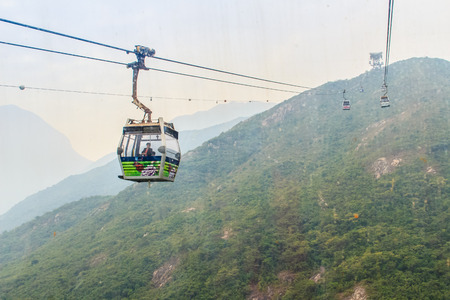 Lantau Island, Hong Kong - November 14, 2014: Beautiful view from Hong Kong cable cars, the popular public transportation from Tung Chung Station to Ngong Ping village, Lantau Island, Hong Kong.のeditorial素材