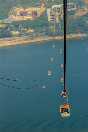 Lantau Island, Hong Kong - November 14, 2014: Beautiful view from Hong Kong cable cars, the popular public transportation from Tung Chung Station to Ngong Ping village, Lantau Island, Hong Kong.のeditorial素材