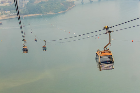 Lantau Island, Hong Kong - November 14, 2014: Beautiful view from Hong Kong cable cars, the popular public transportation from Tung Chung Station to Ngong Ping village, Lantau Island, Hong Kong.のeditorial素材
