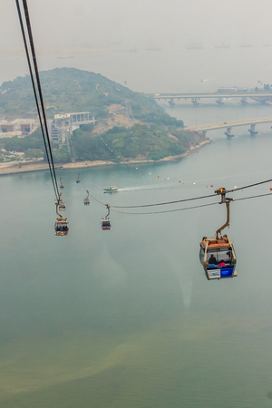 Lantau Island, Hong Kong - November 14, 2014: Beautiful view from Hong Kong cable cars, the popular public transportation from Tung Chung Station to Ngong Ping village, Lantau Island, Hong Kong.のeditorial素材