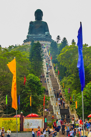 Lantau Island, Hong Kong - November 14, 2014: The tourist visited Giant Tian Tan Buddha statue on the peak of the mountain at Po Lin Monastery in Lantau Island, Hong Kong.のeditorial素材