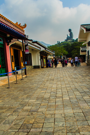 Lantau Island, Hong Kong - November 14, 2014: The tourist visited Giant Tian Tan Buddha statue on the peak of the mountain at Po Lin Monastery in Lantau Island, Hong Kong.のeditorial素材
