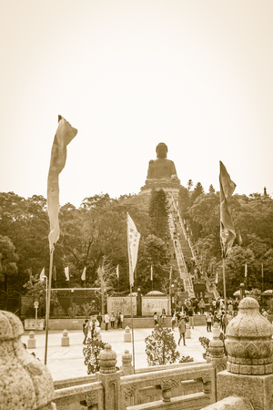 Lantau Island, Hong Kong - November 14, 2014: The tourist visited Giant Tian Tan Buddha statue on the peak of the mountain at Po Lin Monastery in Lantau Island, Hong Kong.のeditorial素材