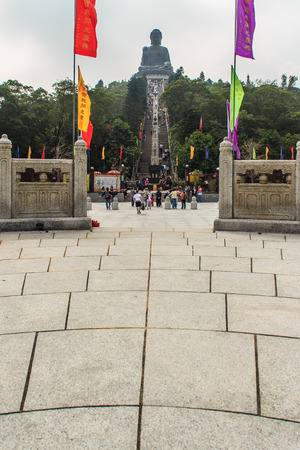 Lantau Island, Hong Kong - November 14, 2014: The tourist visited Giant Tian Tan Buddha statue on the peak of the mountain at Po Lin Monastery in Lantau Island, Hong Kong.のeditorial素材