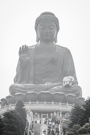Lantau Island, Hong Kong - November 14, 2014: The tourist visited Giant Tian Tan Buddha statue on the peak of the mountain at Po Lin Monastery in Lantau Island, Hong Kong.のeditorial素材