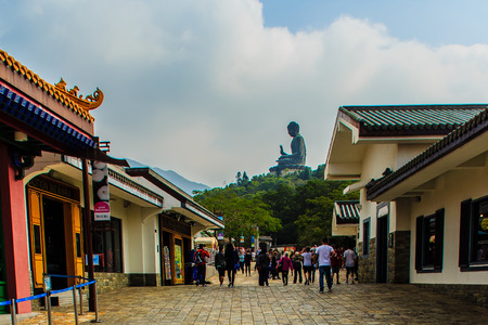 Lantau Island, Hong Kong - November 14, 2014: The tourist visited Giant Tian Tan Buddha statue on the peak of the mountain at Po Lin Monastery in Lantau Island, Hong Kong.のeditorial素材