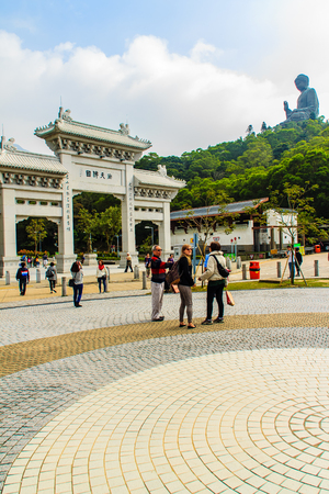 Lantau Island, Hong Kong - November 14, 2014: The tourist visited Giant Tian Tan Buddha statue on the peak of the mountain at Po Lin Monastery in Lantau Island, Hong Kong.のeditorial素材
