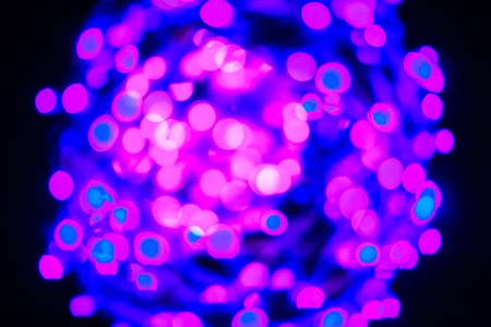 Colorful purple bokeh abstract background. ark purple bokeh background. abstract blurred lights....