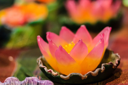 Beautiful Candle Aromatic made to resemble the lotus. Exotic Candle carved lotus shaped Floating on the water for aroma therapy spaの写真素材