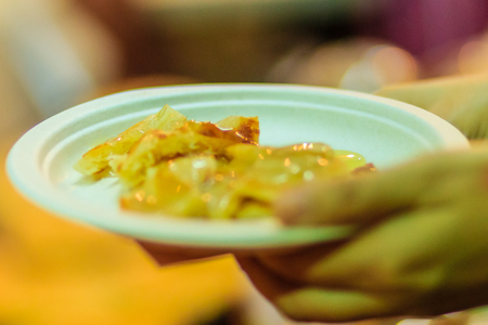 Close up vendor cooking for southern flat bread, mataba, or roti, the popular street food in the night market, Bangkok, Thailand. Kind of Muslim and Indian foodの写真素材