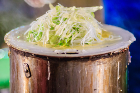 Close up vendor cooking for khaopunpuk, the local food. Khao Pun Phuk, Native steamed dough sheet...