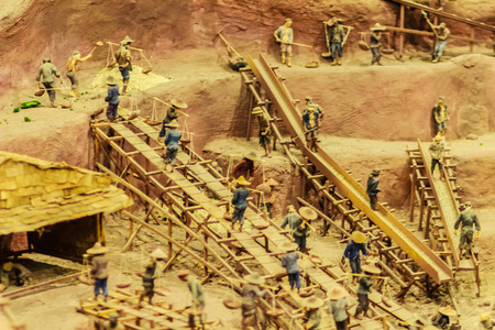 Phuket, Thailand - February 21, 2017: Tin mining dolls models shown the history, miner's life,...