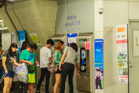 Bangkok, Thailand - February 21, 2017: Passengers bought ticket in counter or ticket vending machine, then they access to inside the Makkasan Airport Rail Link Station to Suvarnabhumi Airport.のeditorial素材