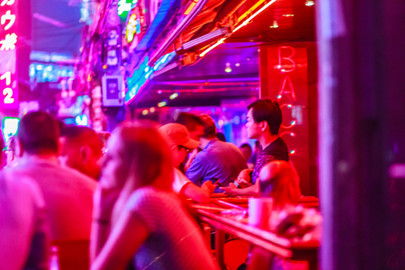 Bangkok, Thailand - February 21, 2017: Tourist visited Soi Cowboy, internationally known as a red light district at the heart of Bangkok's sex industry. Nightlife in Soi Cowboy, Bangkok, Thailand.のeditorial素材