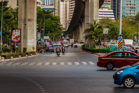 Bangkok, Thailand - February 22, 2017: Heavily traffic jam at Thai-Japanese bridge junction nearby Sala Daeng, Silom Road and Lumpini park area in Bangkok, Thailand.のeditorial素材