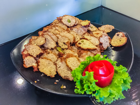 Close up fried sour fish sausage, the delicious Thai food menu that you don't miss.の写真素材