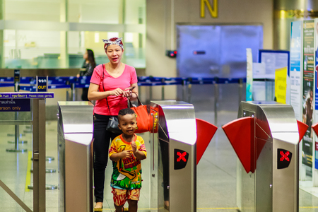 Bangkok, Thailand - February 22, 2017: Unidentified passenger access barrier to MRT (Metropolitan Rapid Transit) subway stationのeditorial素材