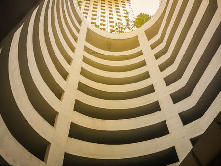 Parking garage on the building in oval structure.のeditorial素材