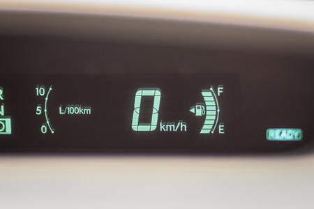 Modern digital mileage odometer and speed meter on dashboard when parking at 0 km/h.の写真素材