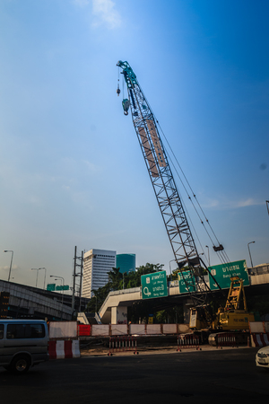 Bangkok, Thailand - March 8, 2017: New green lines of Bangkok BTS sky train during construction at Phahol Yothin Road, Bangkok, Thailand.のeditorial素材