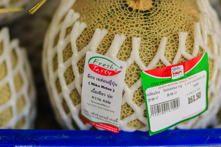 Bangkok, Thailand - April 23, 2017: Extra jumbo grade of Japanese melons for sale at the Or Tor Kor fresh market. A melon is the family Cucurbitaceae with sweet edible, fleshy fruit.のeditorial素材