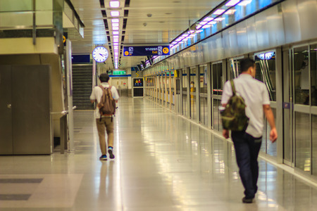 Bangkok, Thailand - April 23, 2017: After arrived their destinations, the passengers were walking to exit the MRT subway station.のeditorial素材
