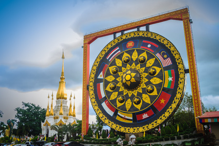 Beautiful Buddhist giant gong with southeast asian flags painted at Wat Tham Khuha Sawan temple, Khong Chiam District, Ubon Ratchathani Province,Thailand.の写真素材