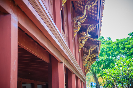 Beautiful northern thai style house pattern of teak wood craving on balcony baluster. Antique...