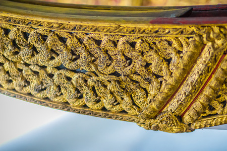 Beautiful traditional Thai style craving patterned of Suphannahong royal barge. Swan head craved pattern in thai royal barge. の写真素材