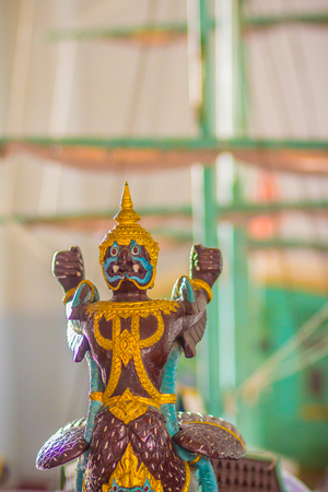 Garuda model in front of Thai royal march boat. Thai boat with garuda decoration on the front of the boat.の写真素材