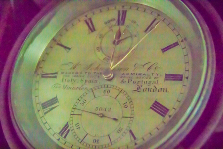 Vintage old marine chronometer, a timepiece that is precise and accurate enough to be used as a...