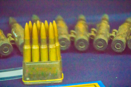 Old anti-aircraft 12.7 mm. bullets for machine gun. Bullets in ammunition belt for machine gun.の写真素材