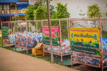 Ubon Ratchathani, Thailand - December 2, 2017: Colorful separation recycle bin at Buangam Witthaya Secondary School by the waste separation to capital project.のeditorial素材